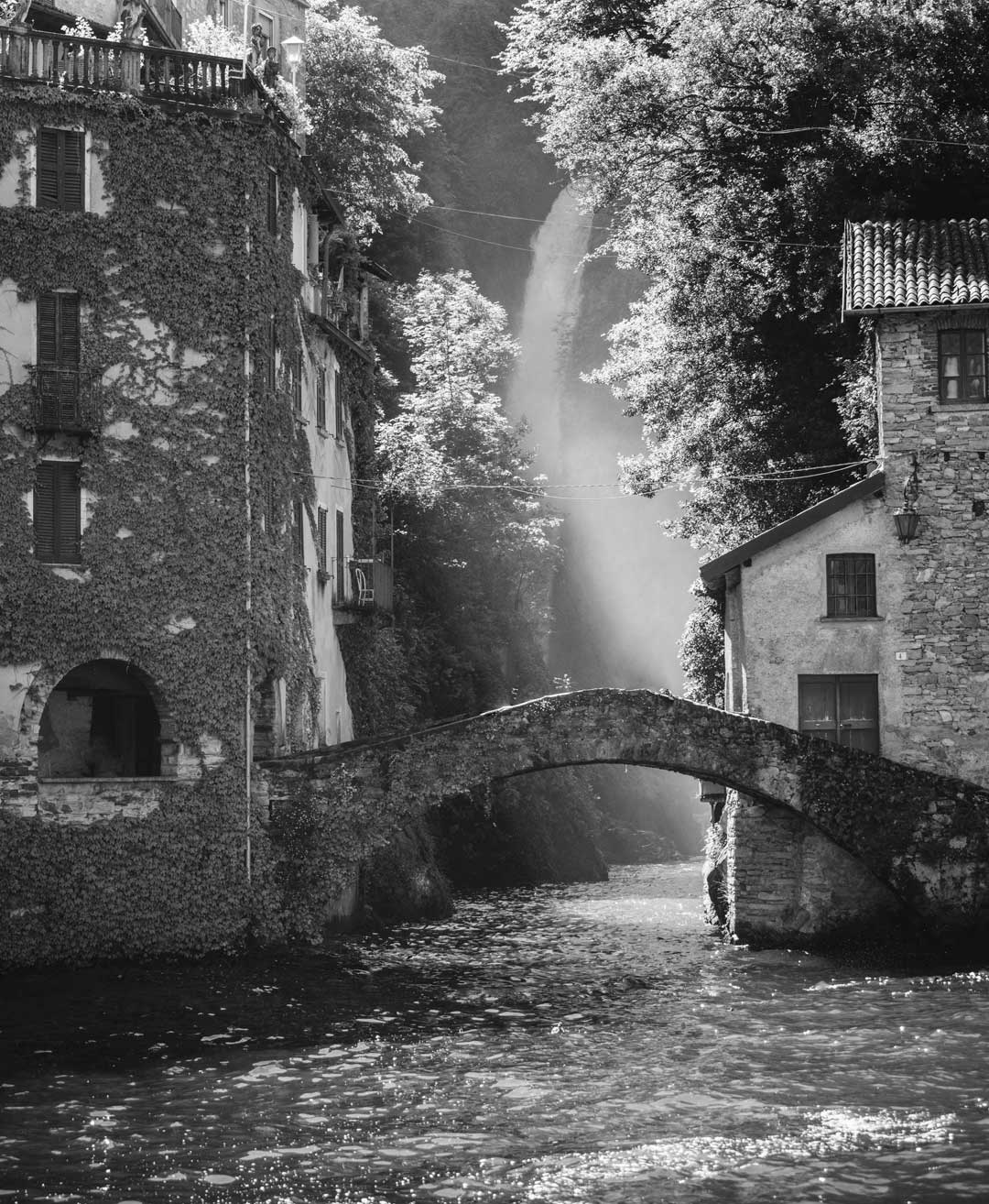 View of Orrido di Nesso, Nesso Bridge, from a self-drive boat on Lake Como.